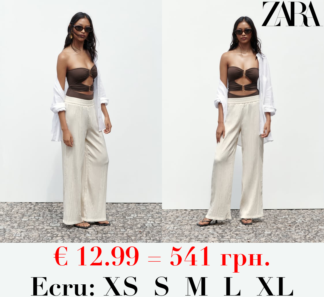 CREASED-EFFECT PALAZZO TROUSERS