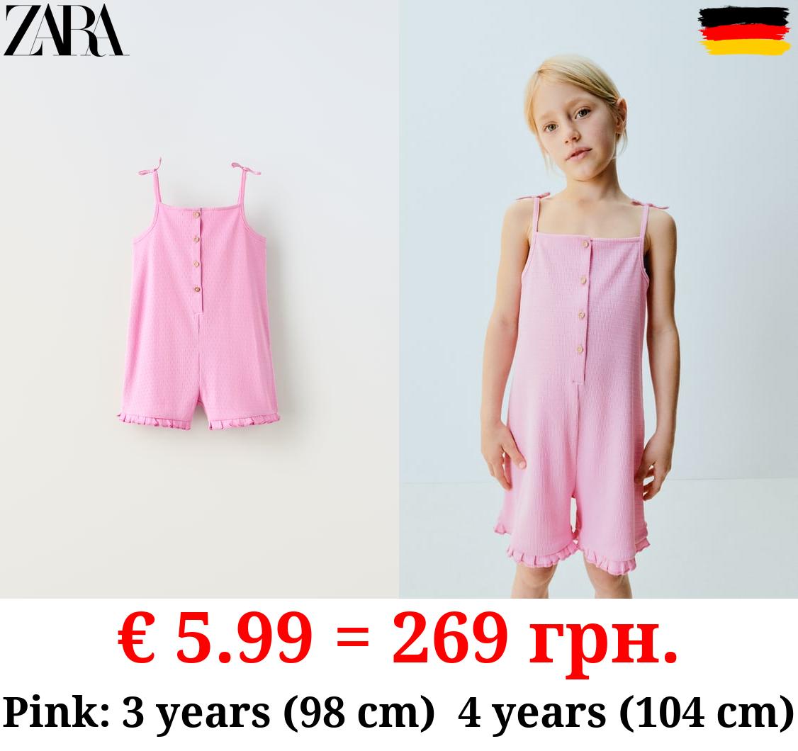 JUMPSUIT WITH BUTTONED STRAPS