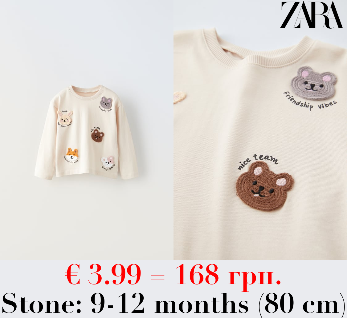 T-SHIRT WITH APPLIQUÉS