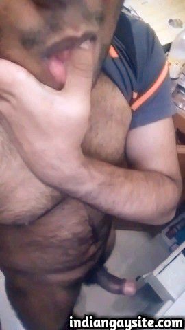 Indian gay video of a horny desi hunk masturbating his big cock in office a...