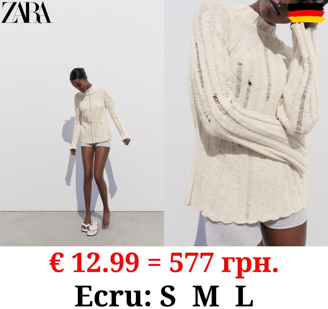 RIBBED KNIT SWEATER WITH RIPS