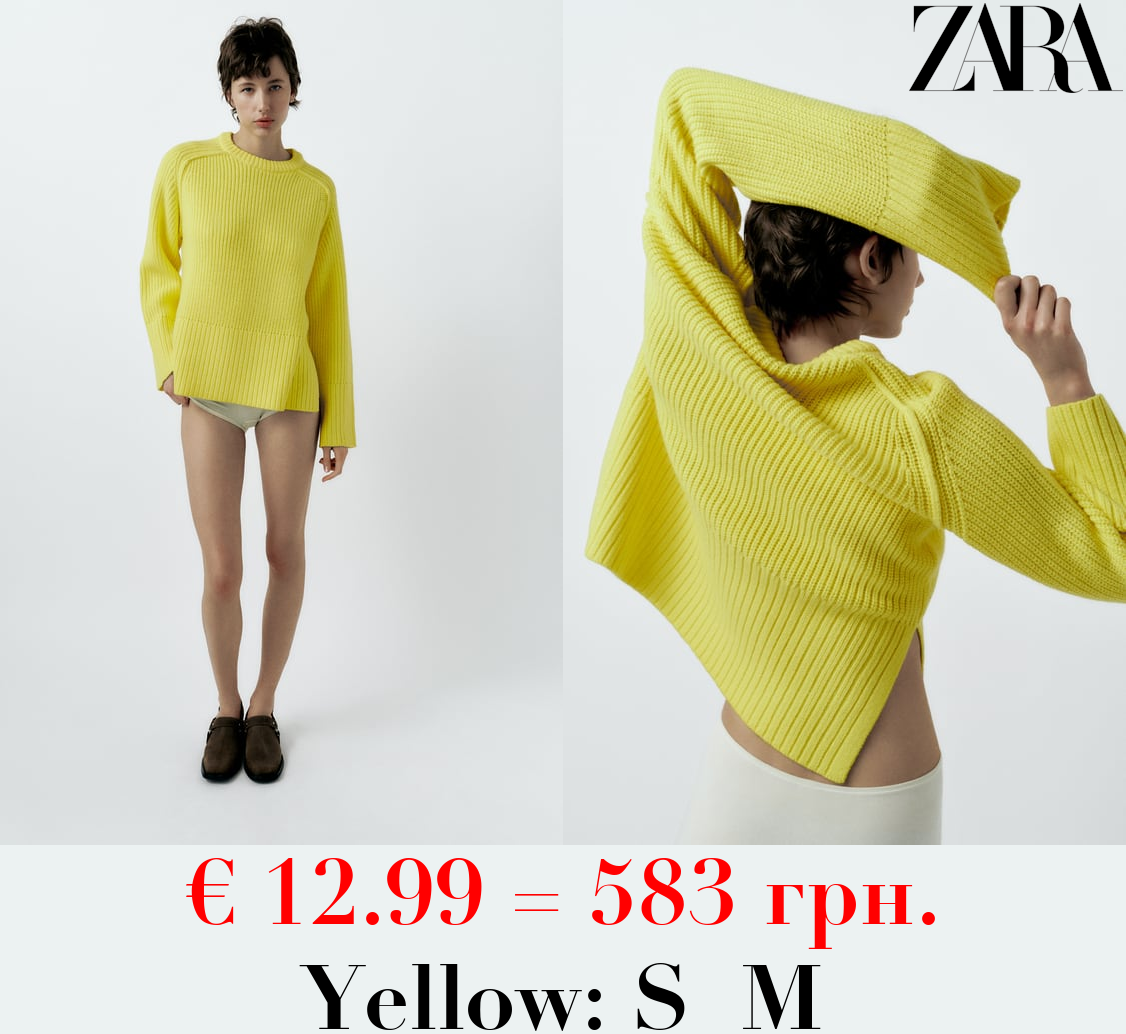 PLAIN KNIT SWEATER WITH SIDE VENTS