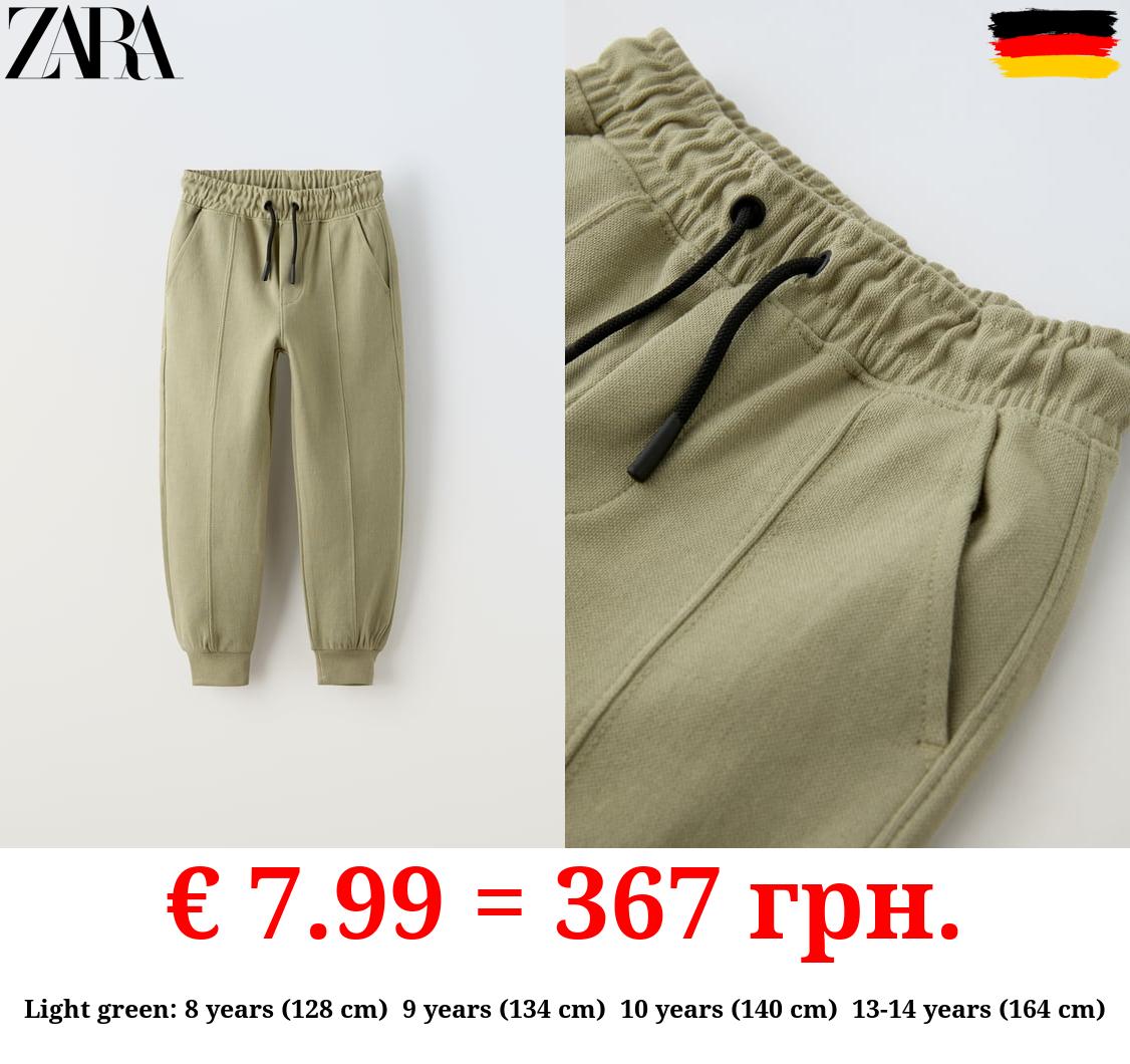 PIQUÉ TROUSERS WITH SEAM DETAIL