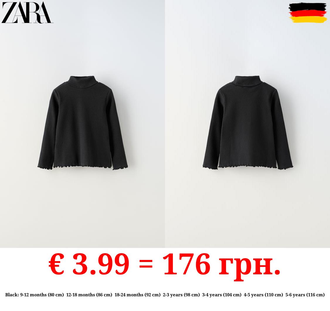 RIBBED TOP WITH SCALLOPED DETAILS