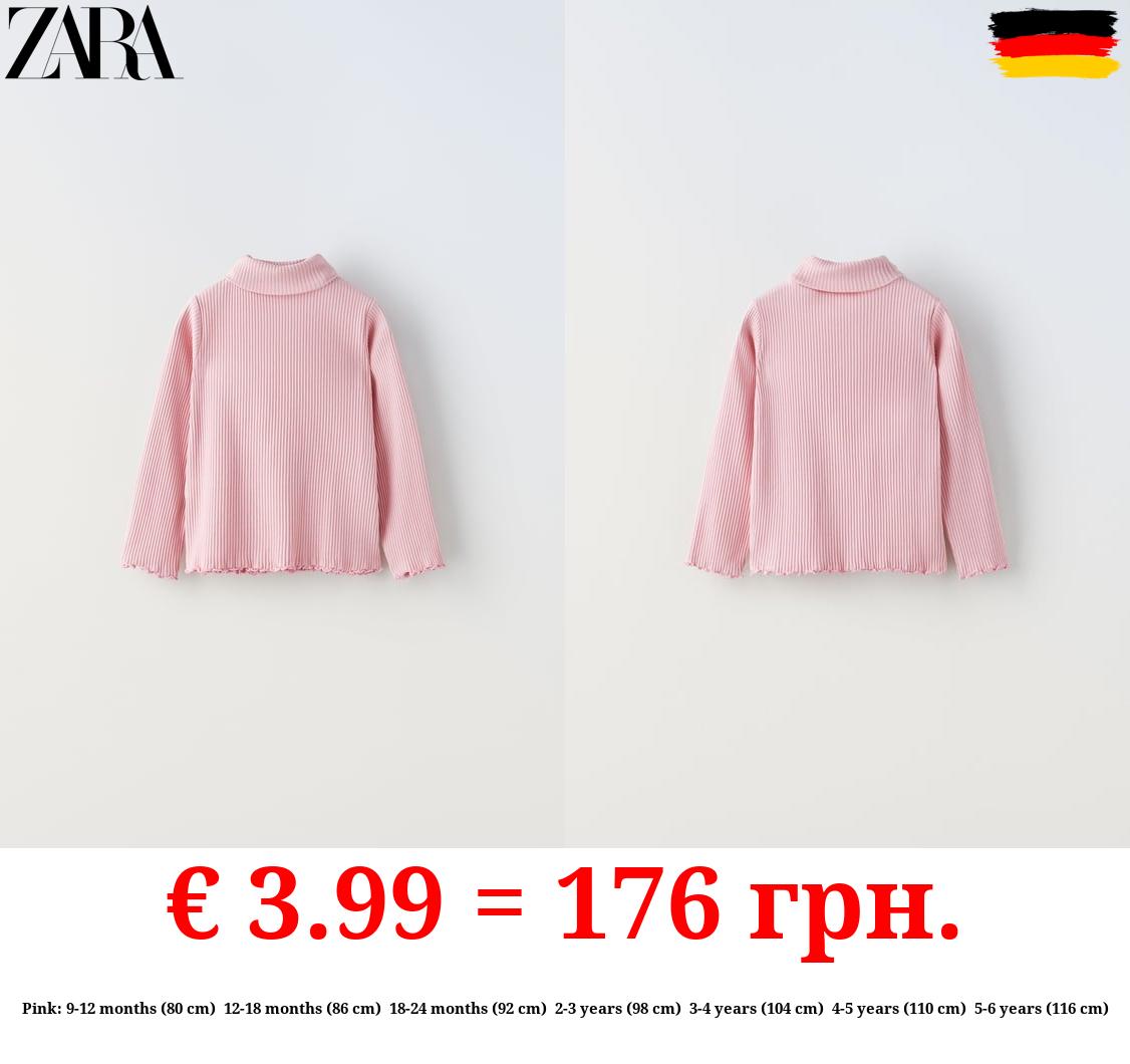 RIBBED TOP WITH SCALLOPED DETAILS