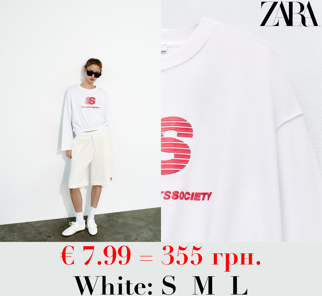 SWEATSHIRT WITH SLOGAN AND GRAPHIC