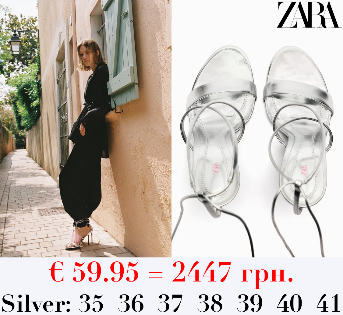 LACE UP LEATHER SANDALS WITH FEATHERS