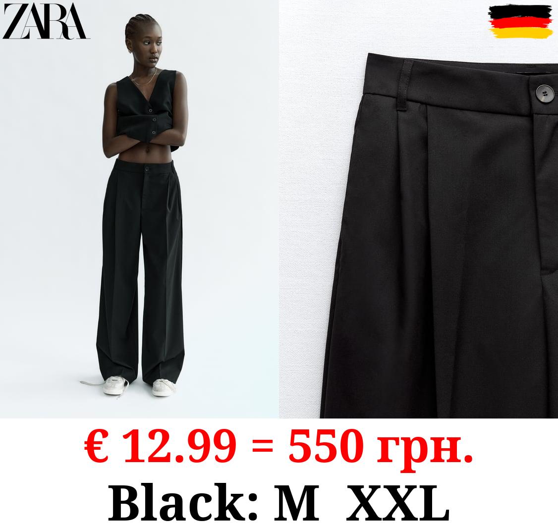 FULL-LENGTH PLEATED TROUSERS