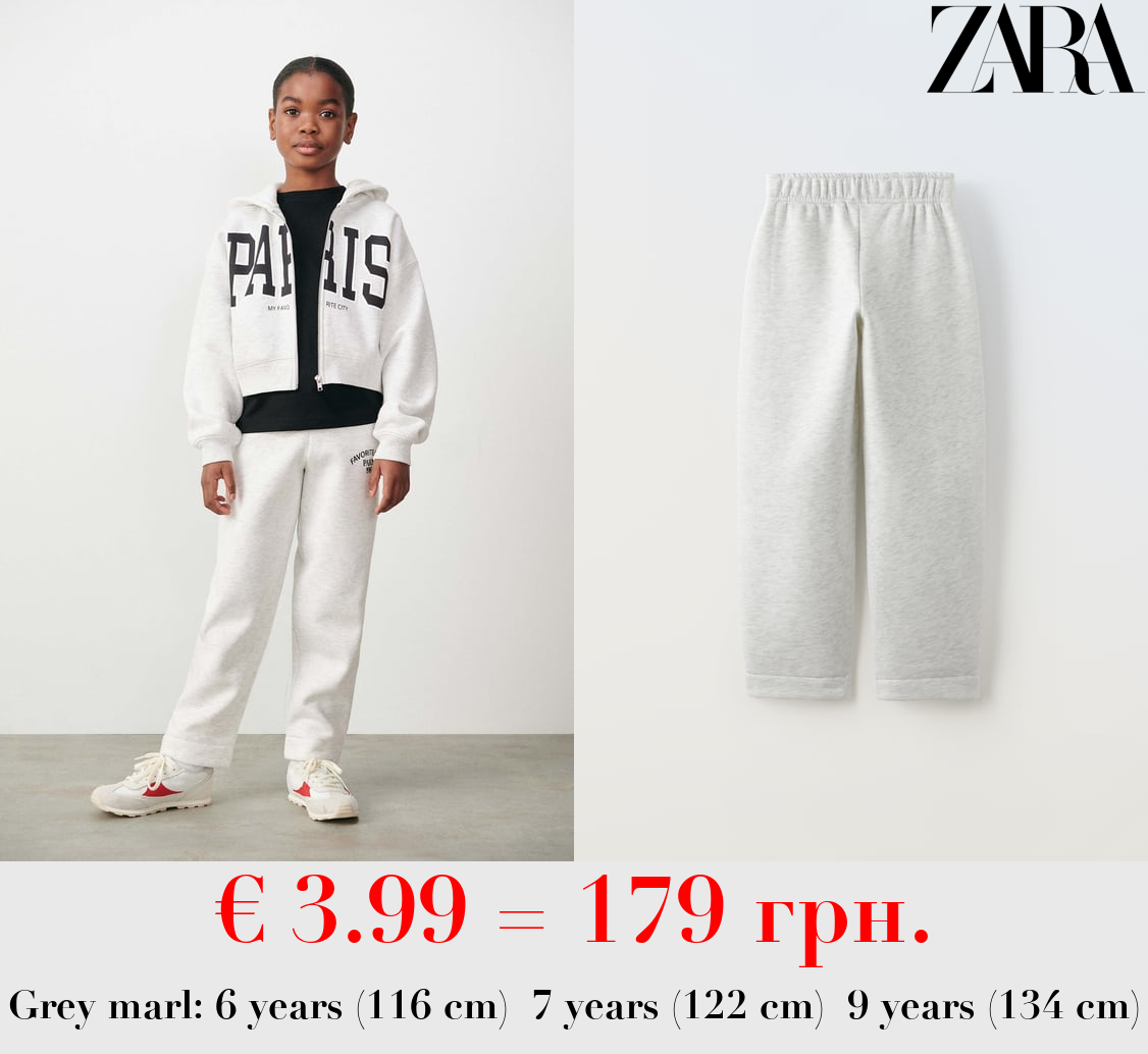 JOGGING TROUSERS WITH SLOGAN