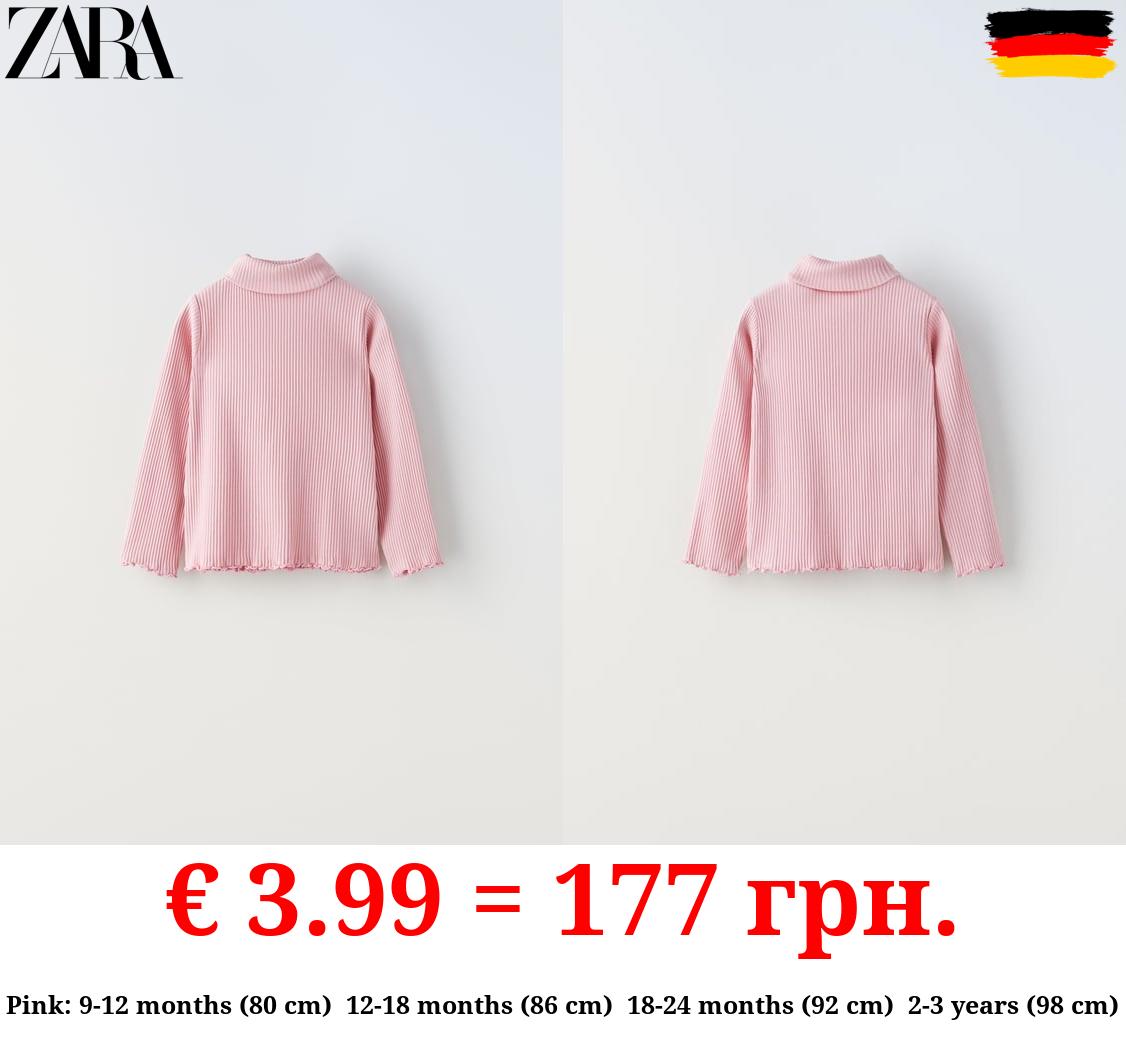 RIBBED TOP WITH SCALLOPED DETAILS