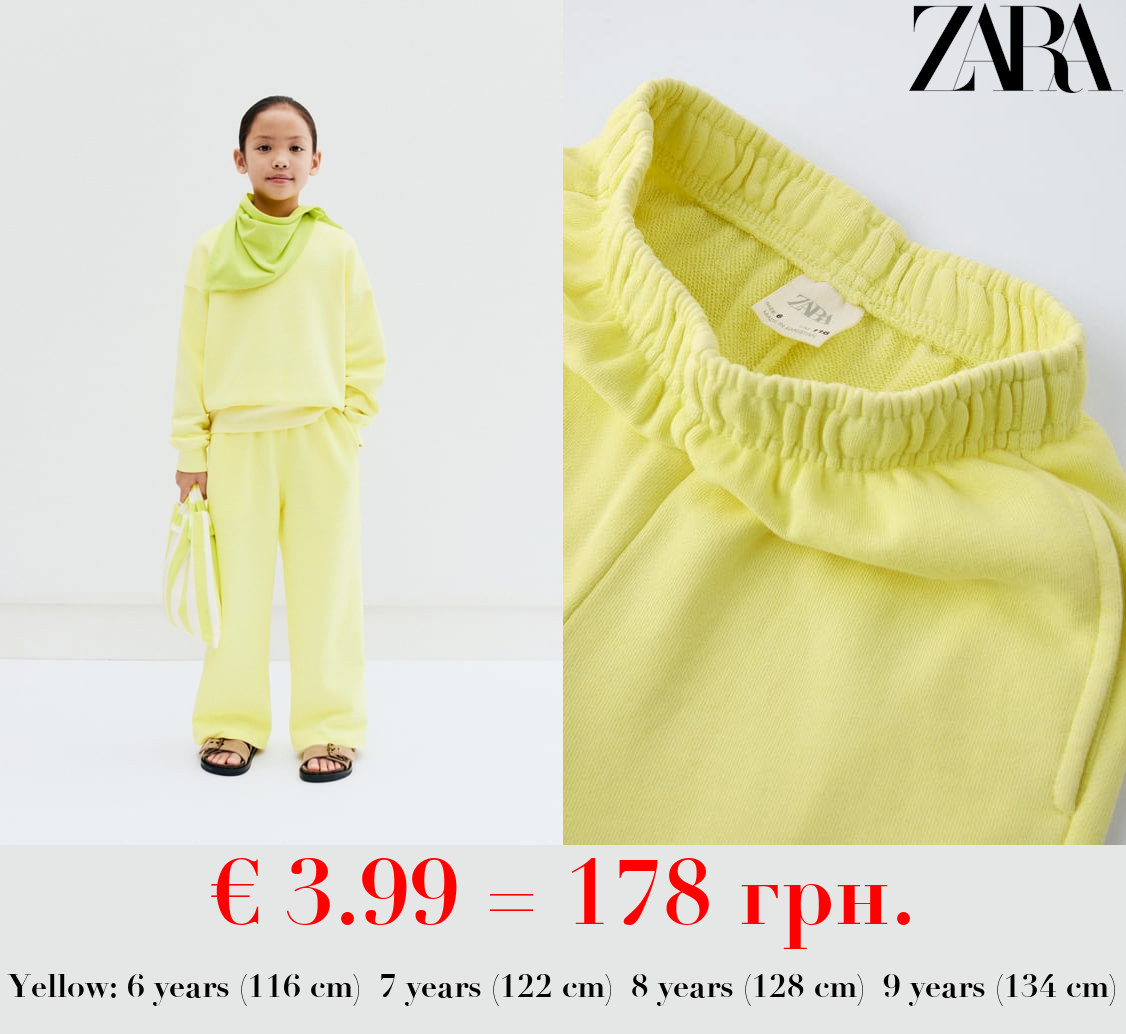 WIDE-LEG FADED-EFFECT JOGGING TROUSERS