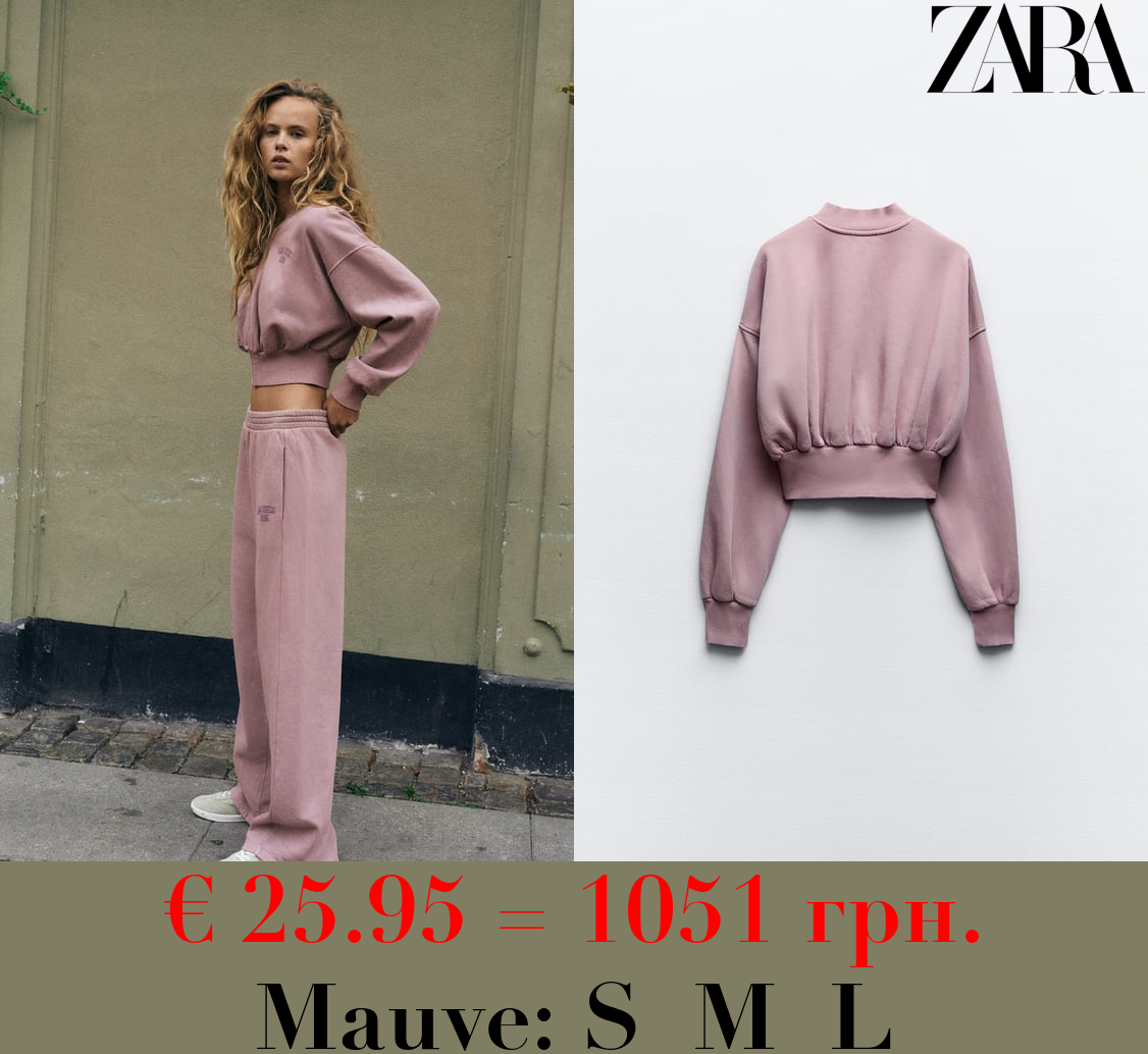 EMBROIDERED FADED-EFFECT SWEATSHIRT