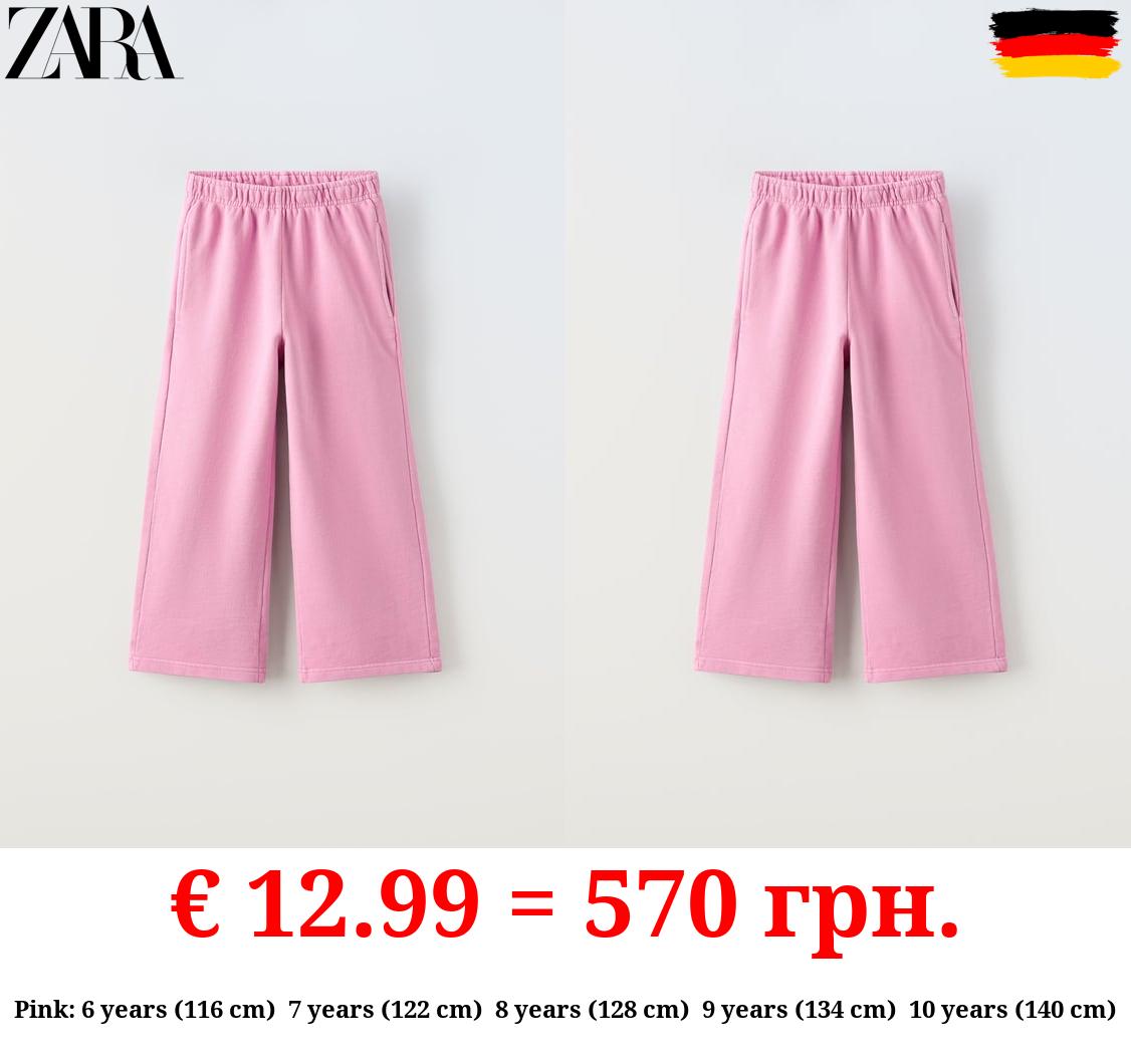 WIDE-LEG FADED-EFFECT JOGGING TROUSERS