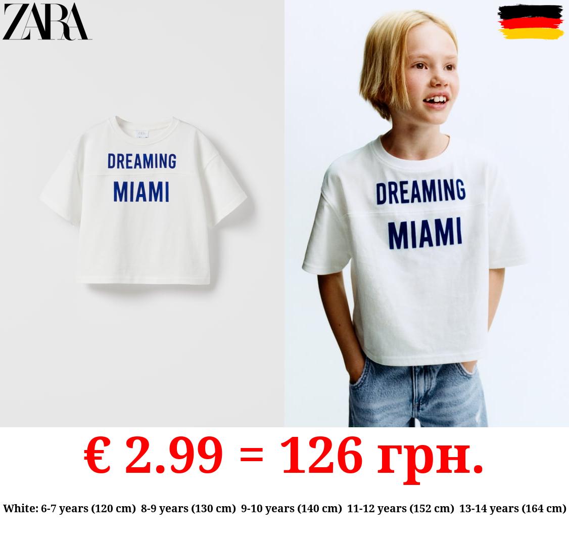 T-SHIRT WITH EMBOSSED TEXT