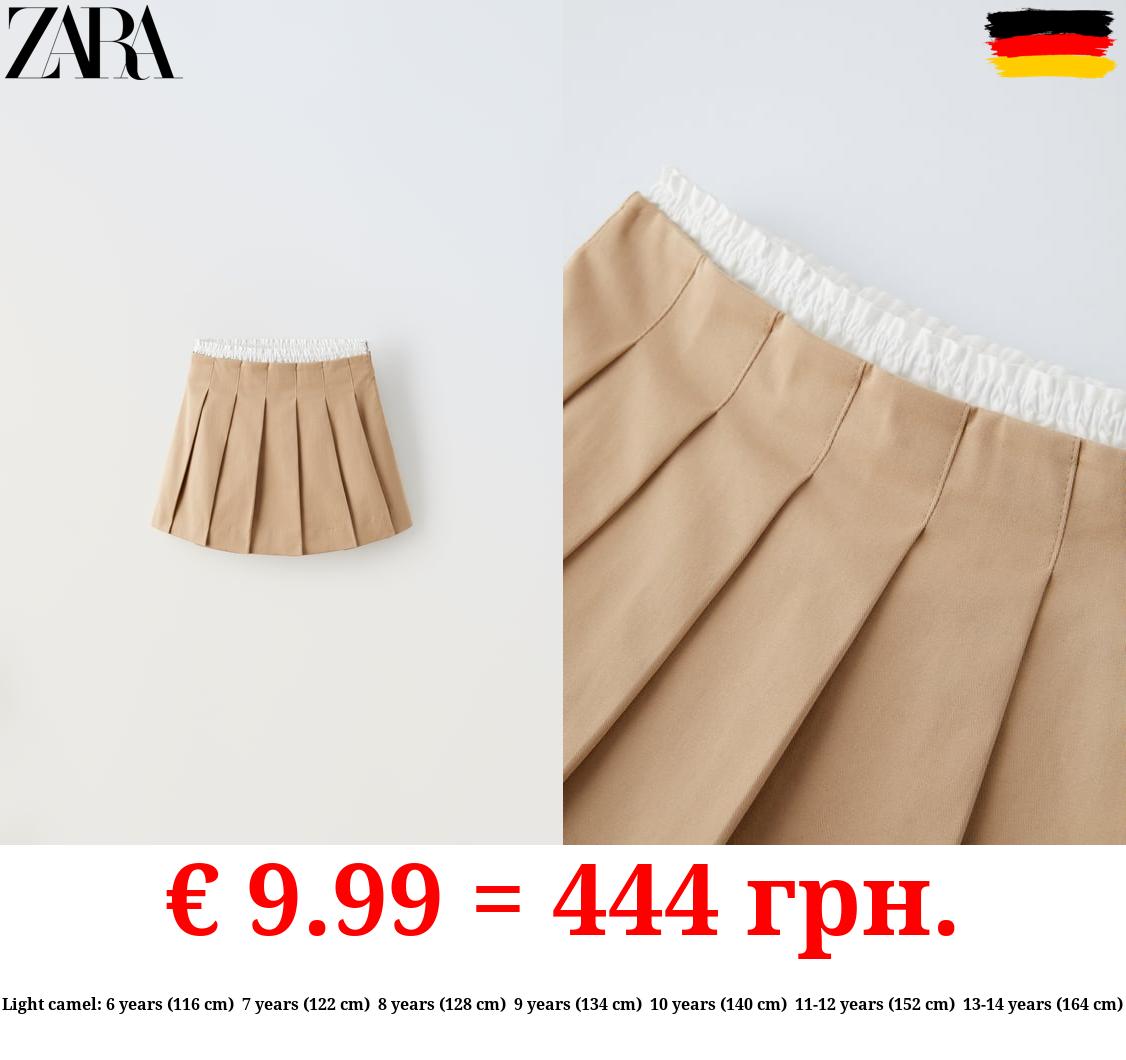 CONTRAST PLEATED SKIRT