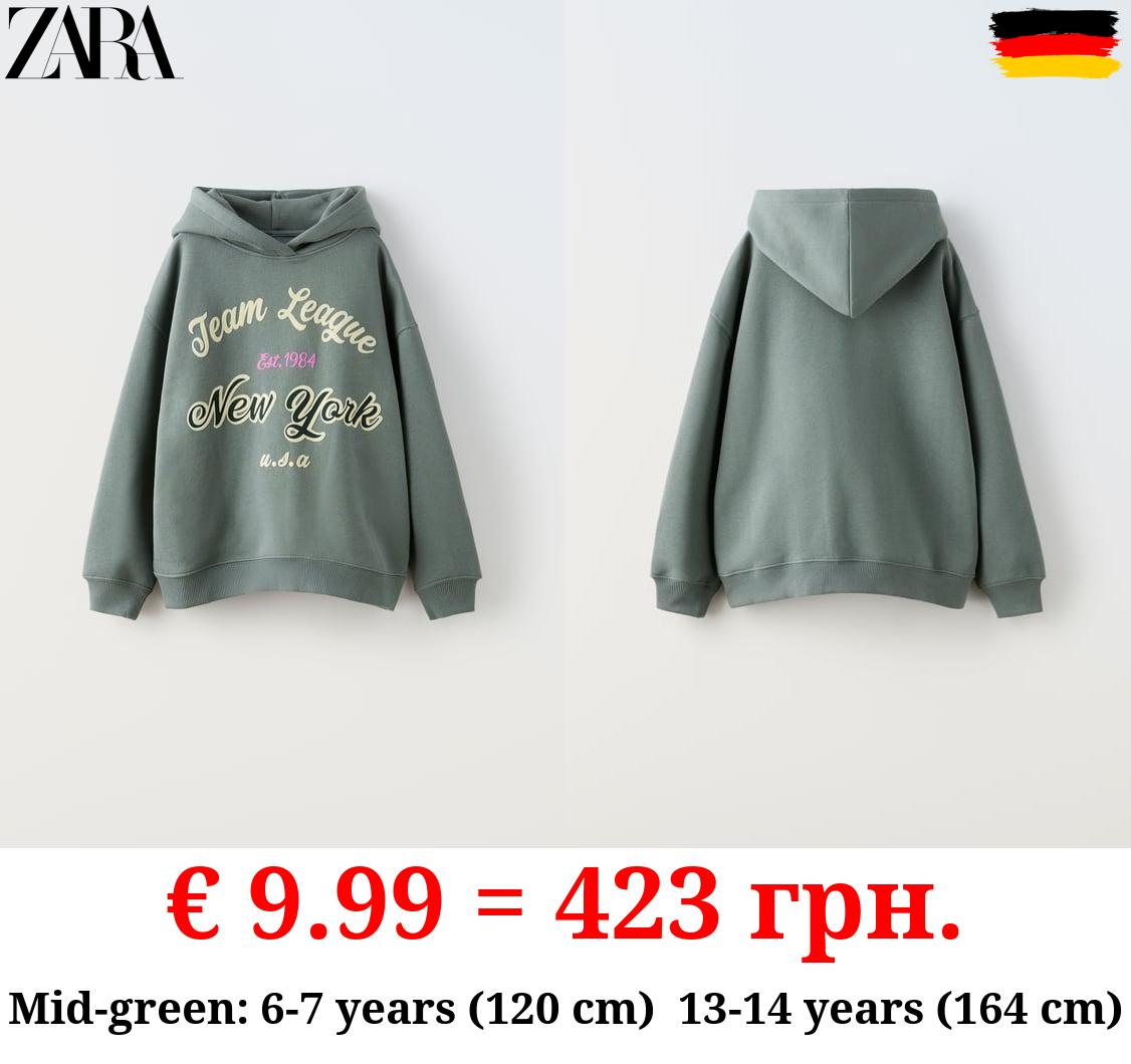 FLOCKED SLOGAN HOODIE