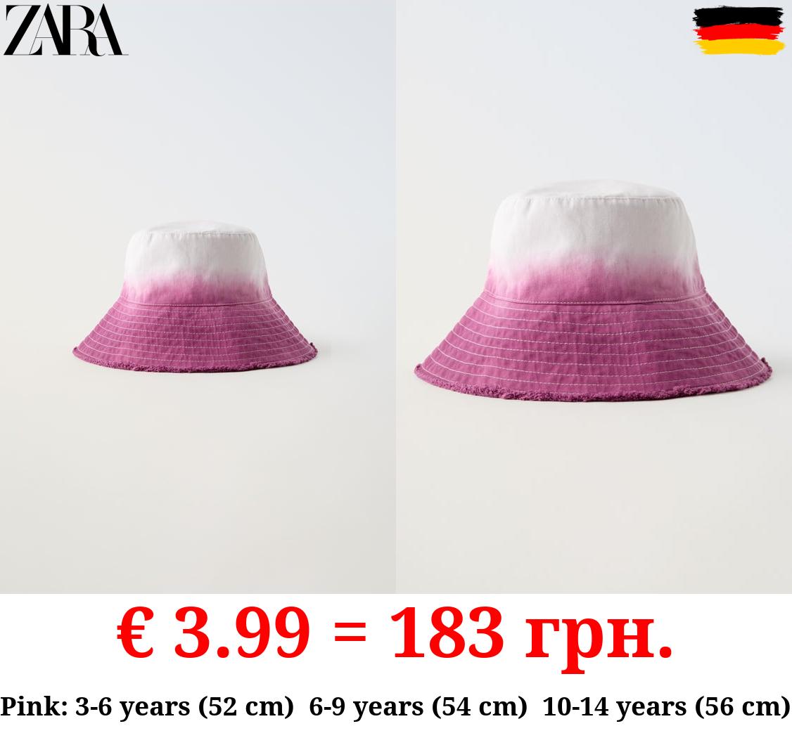 FRAYED TIE-DYE BUCKET HAT