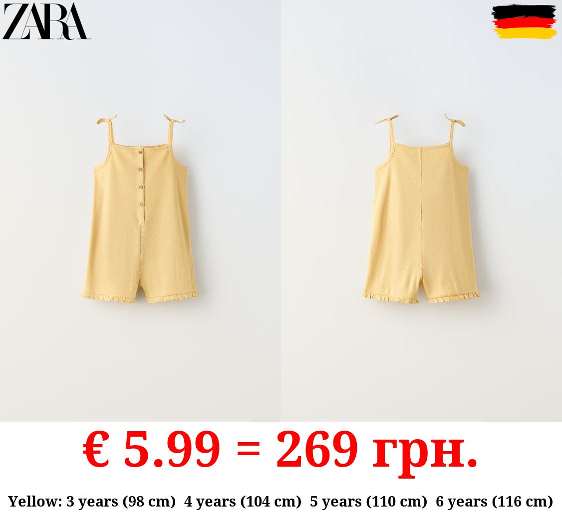 JUMPSUIT WITH BUTTONED STRAPS