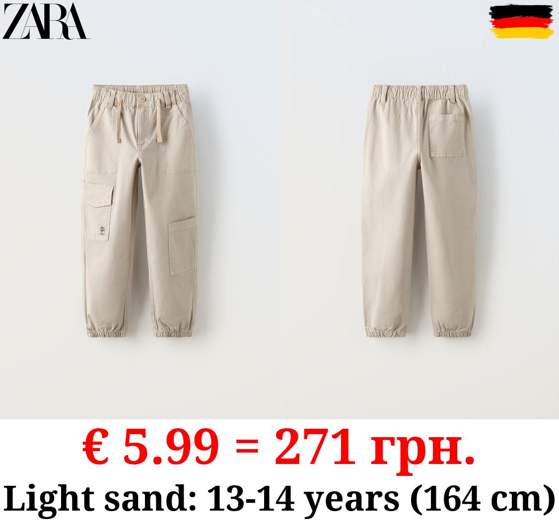 CANVAS TROUSERS WITH POCKETS