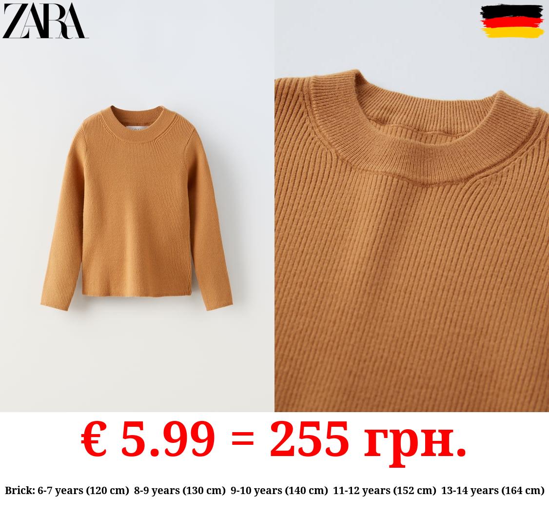 RIBBED KNIT SWEATER