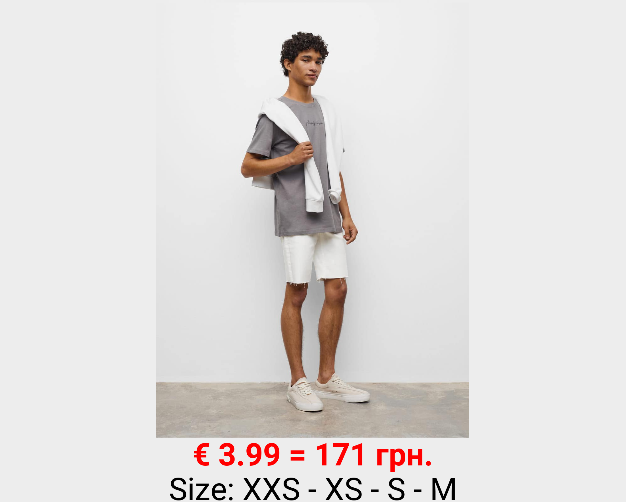 Bermudas denim bajo deshilachado