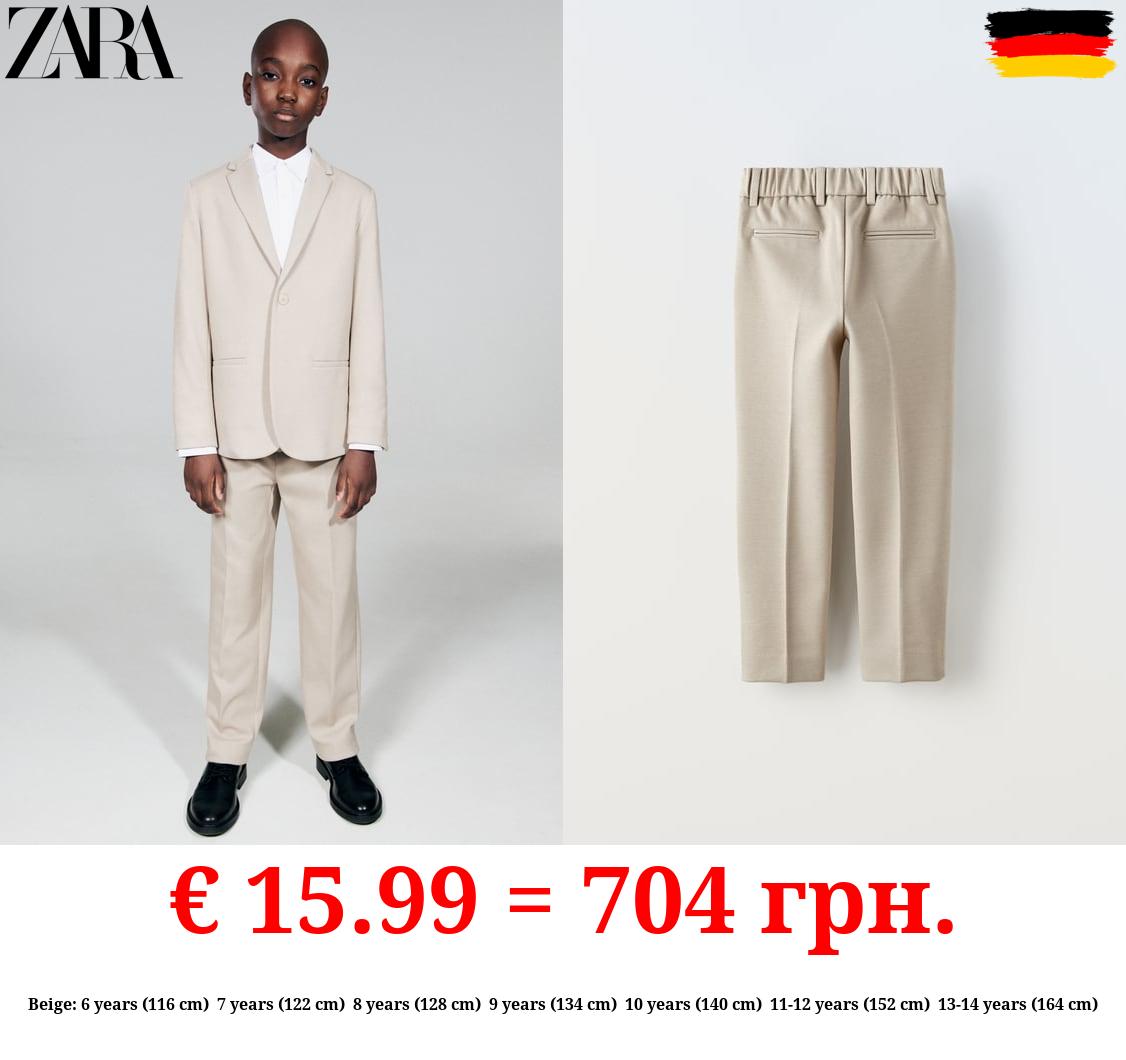 TEXTURED COMFORT SUIT TROUSERS