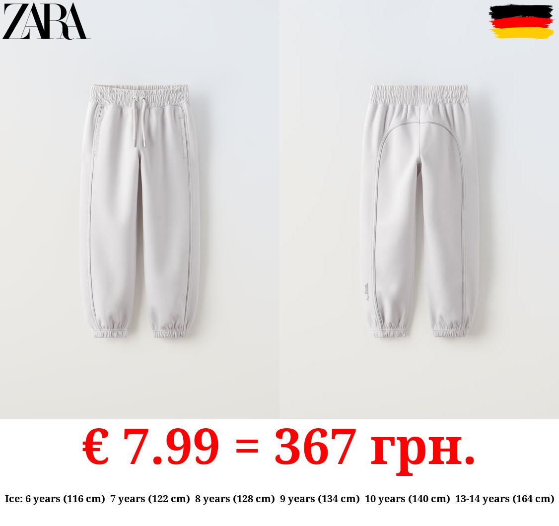 SPORTY JOGGERS WITH SHIMMERY TRIMS