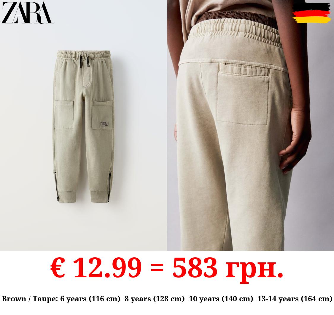 PLUSH TROUSERS WITH ZIPS
