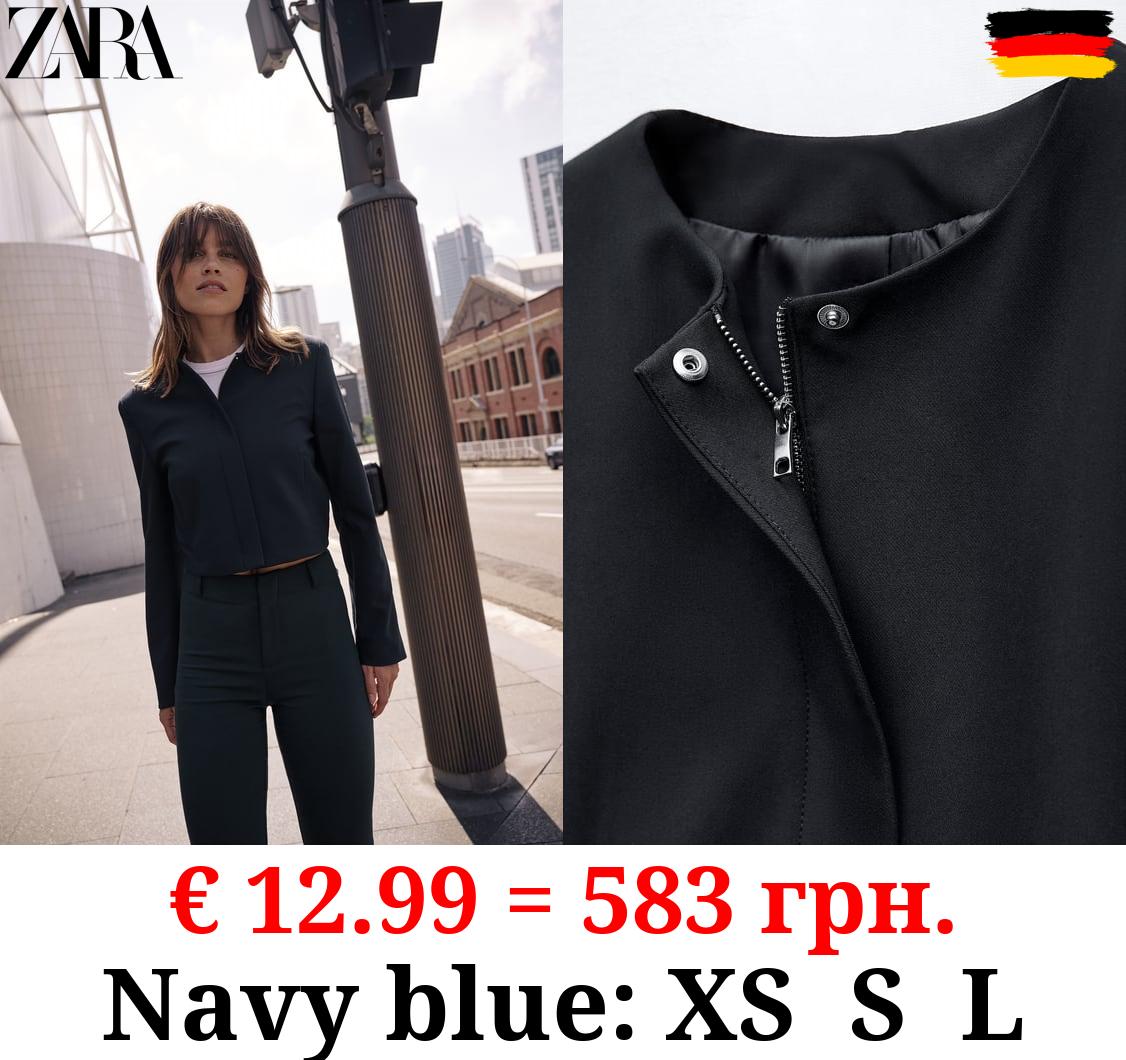 RIBBED JACKET WITH ELASTICATED DETAIL