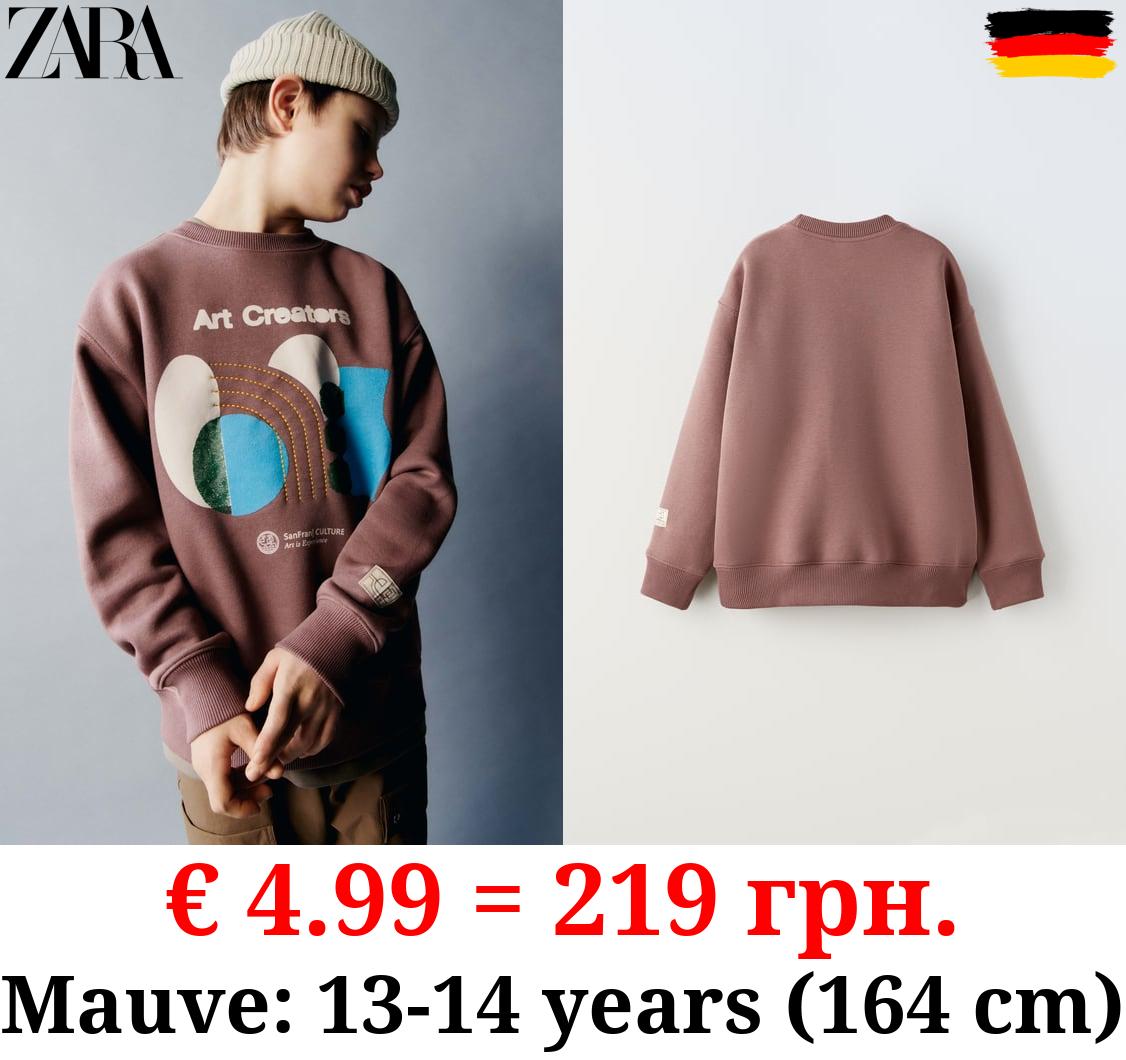 FLOCKED AND EMBROIDERED PRINTED SWEATSHIRT