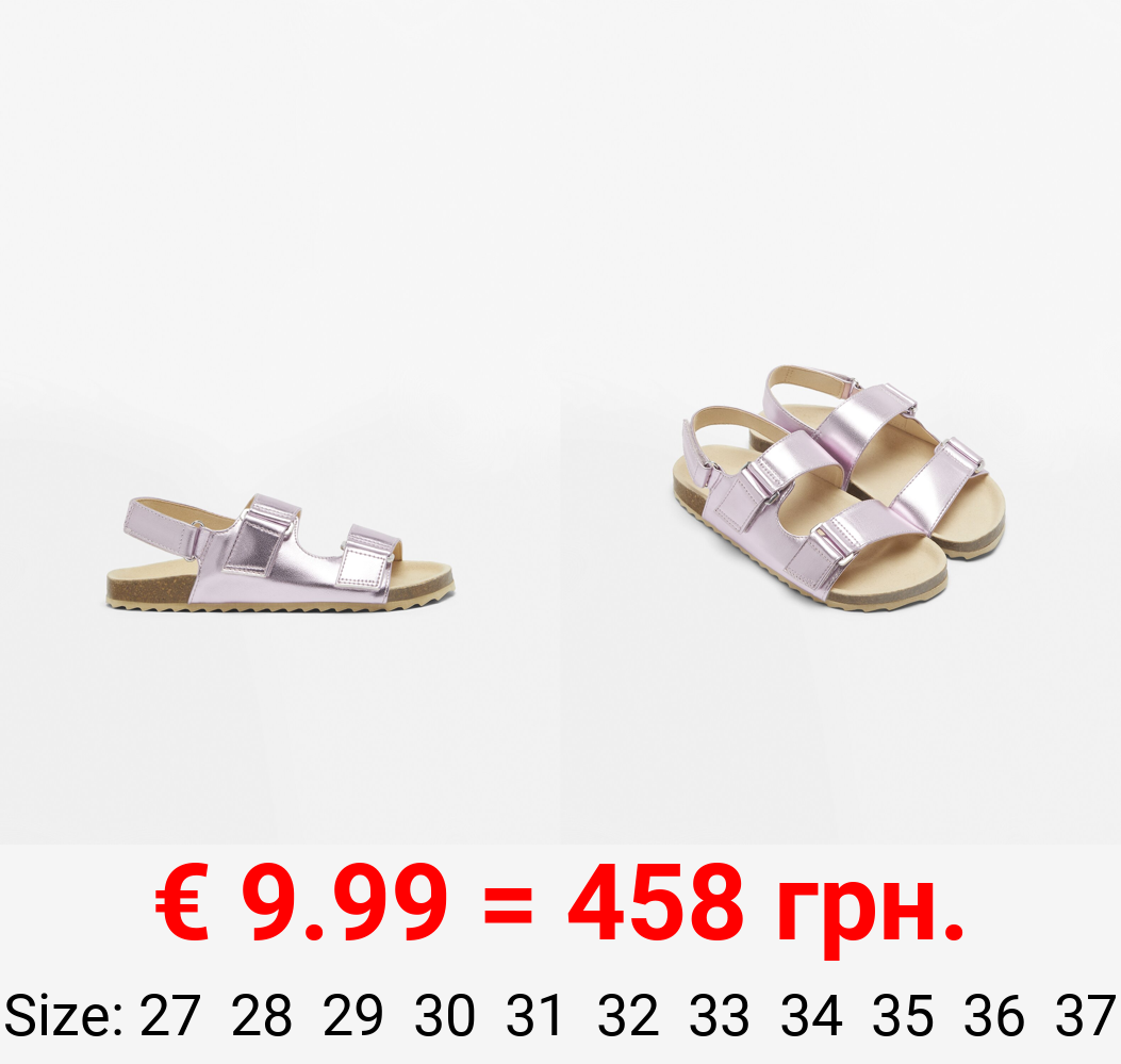 Sandals with metallic buckles