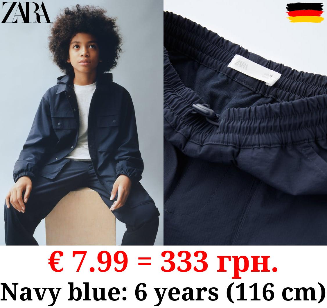 LINED NYLON TROUSERS