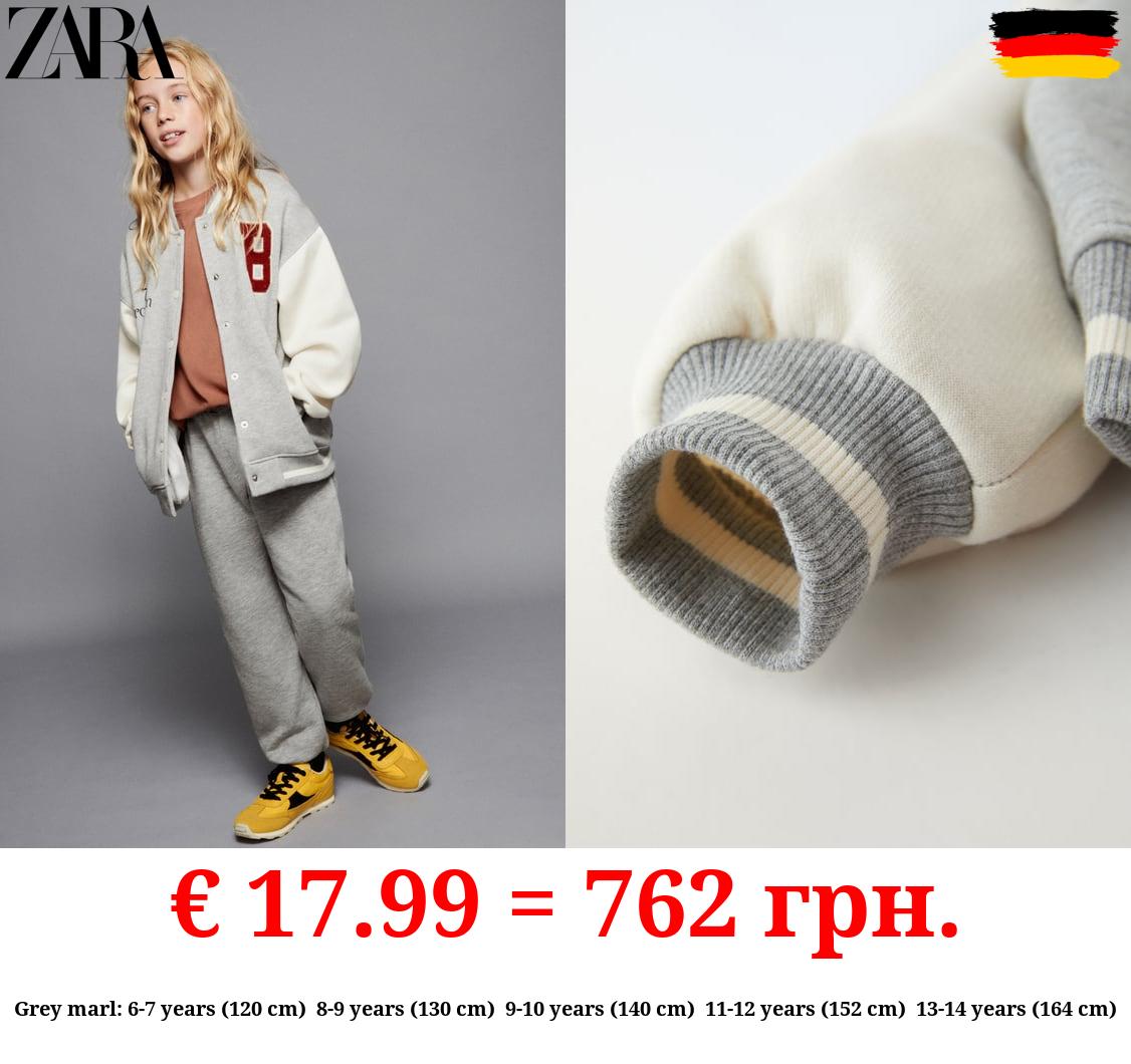 BOMBER JACKET WITH TERRY PATCH