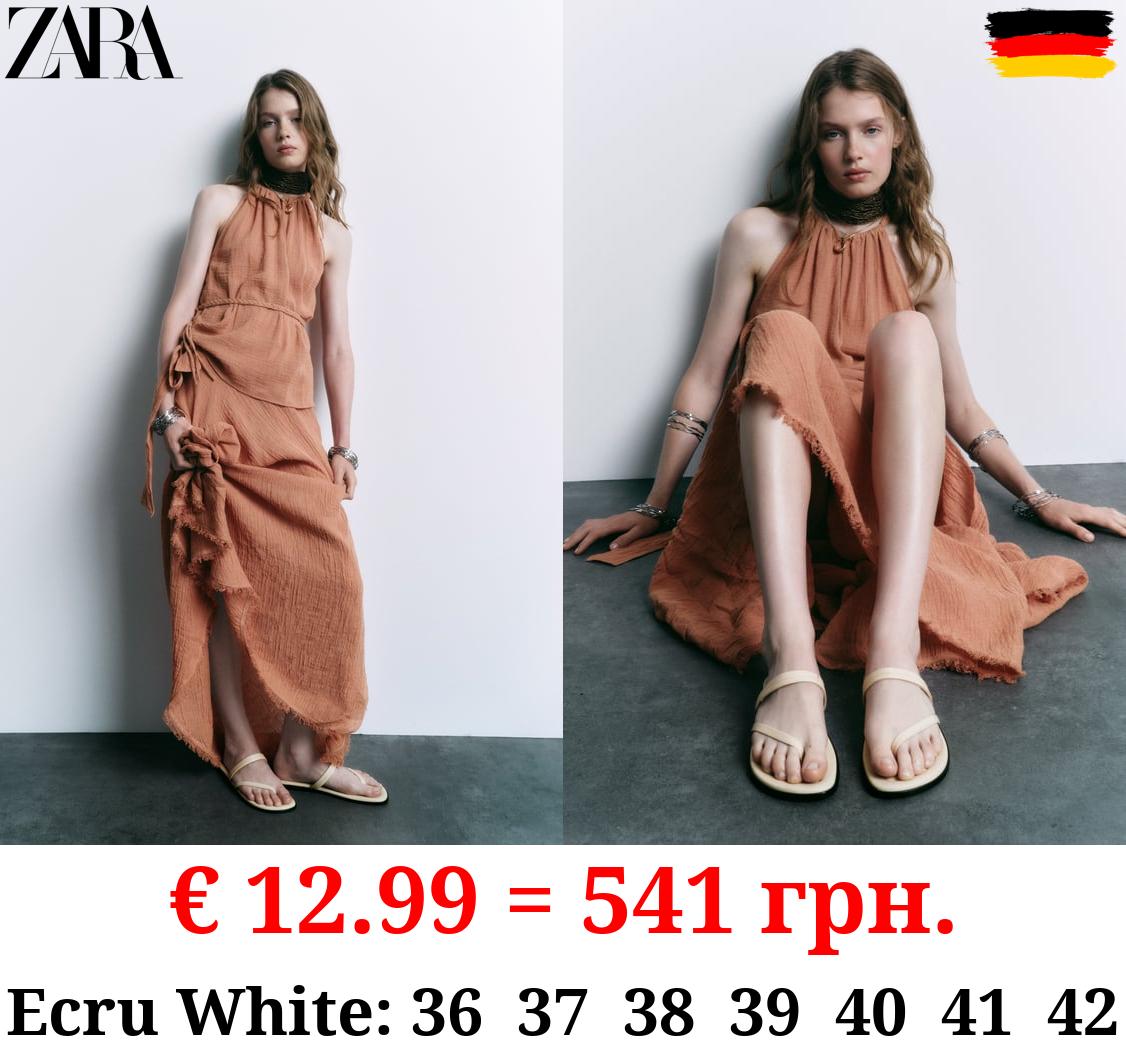 FLAT ASYMMETRIC SANDALS