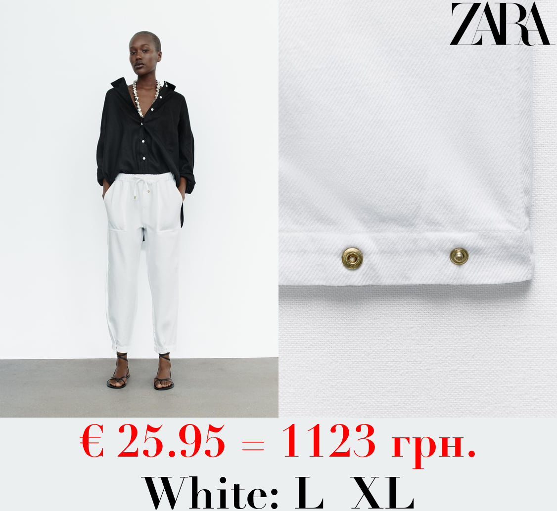 CARPENTER TROUSERS WITH POCKET AND BUTTONED HEMS