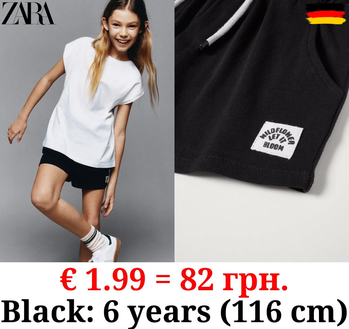 PLUSH BERMUDA SHORTS WITH LABEL DETAIL