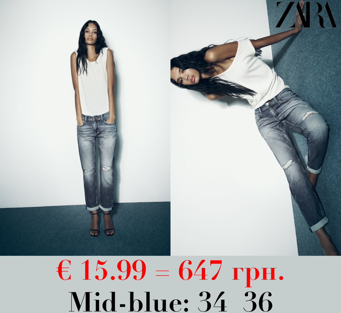 Z1975 RIPPED SPLIT-HEM LOW-RISE JEANS