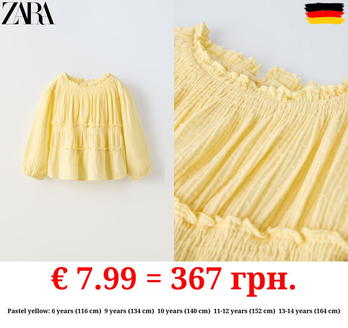 DOTTED MESH SHIRT WITH ELASTIC DETAILS