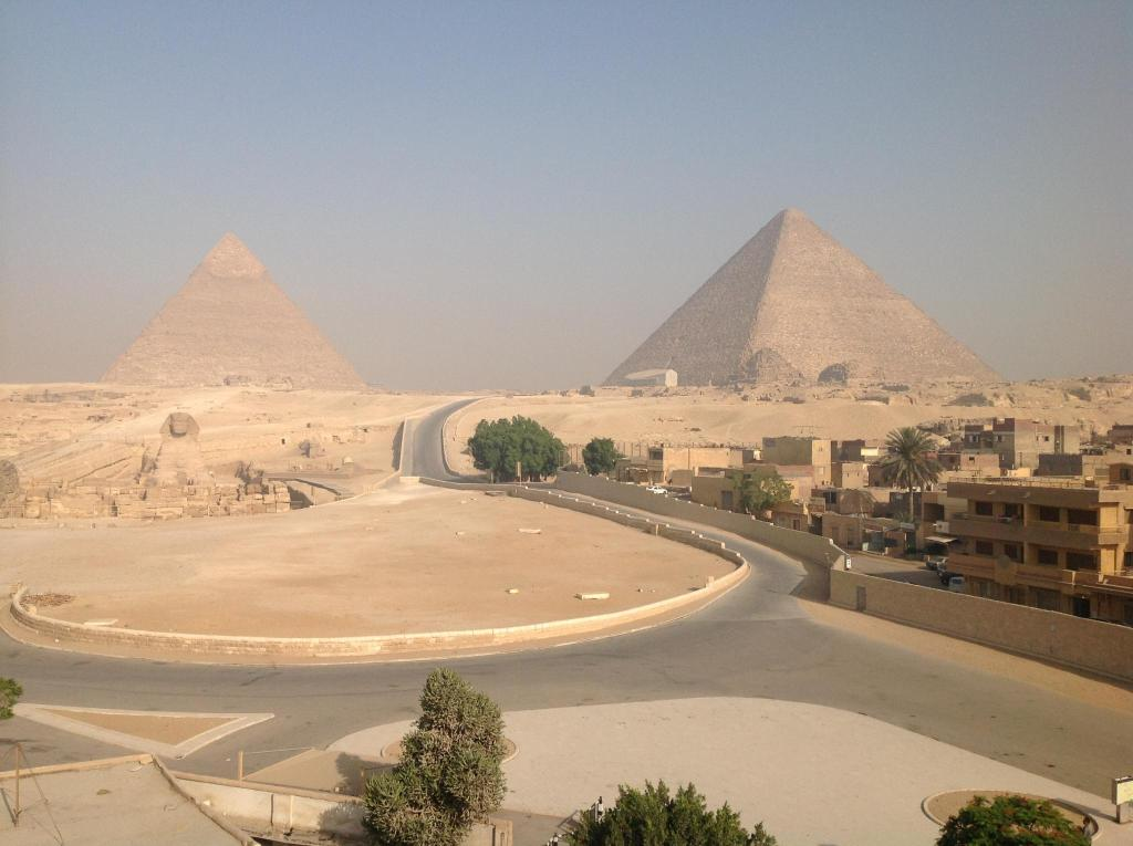 Каир Египет. Каир столица. Гезира Египет. Египет Пески пирамиды Оазис. Главный город египта