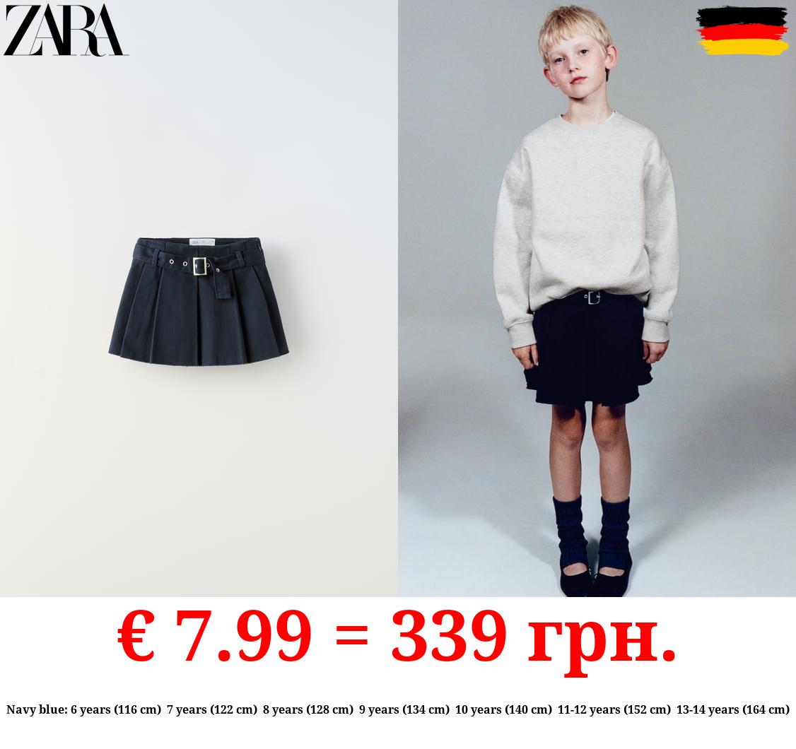 BOX PLEAT SKIRT WITH BUCKLE