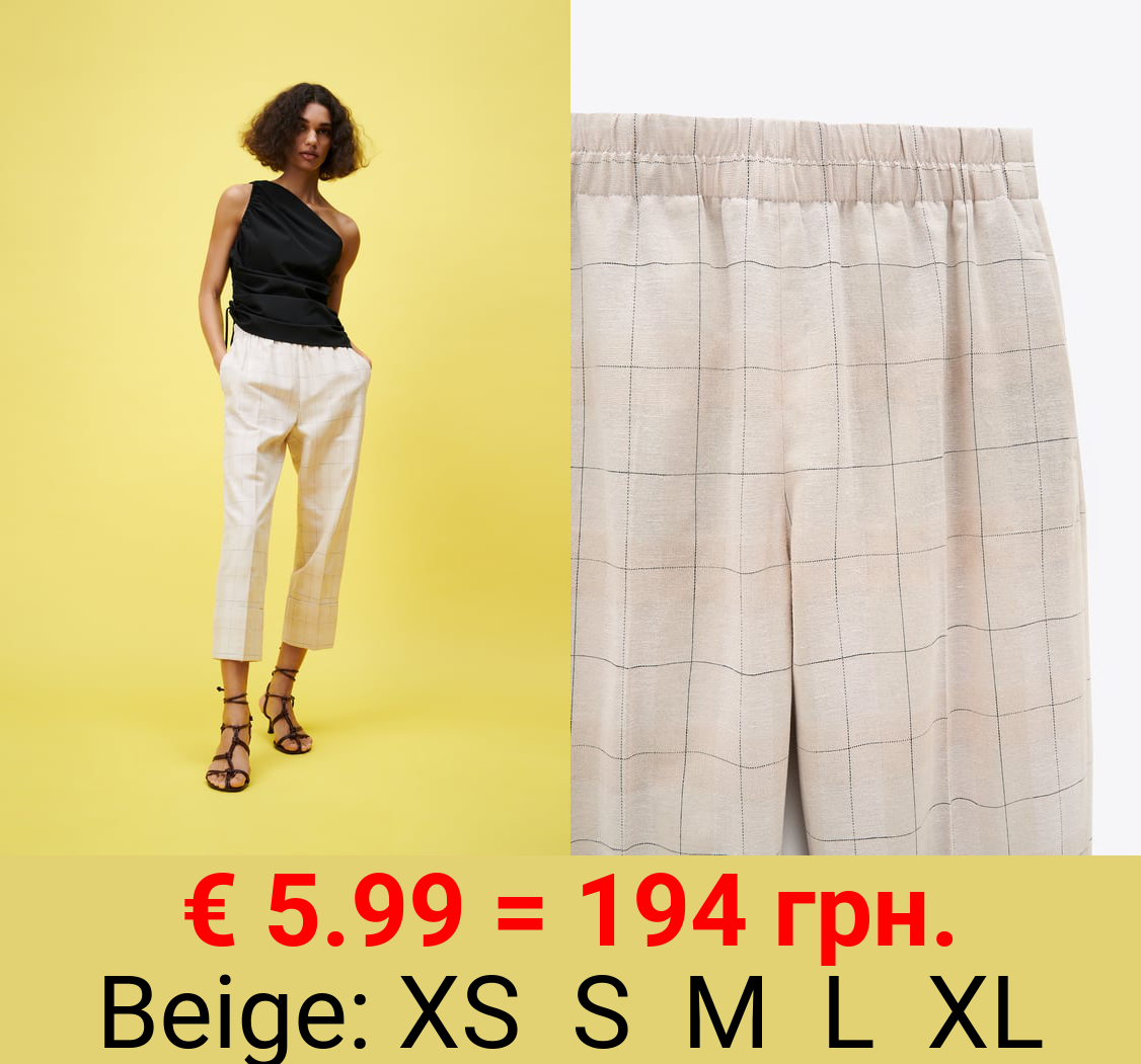 TROUSERS WITH TURN-UP HEMS