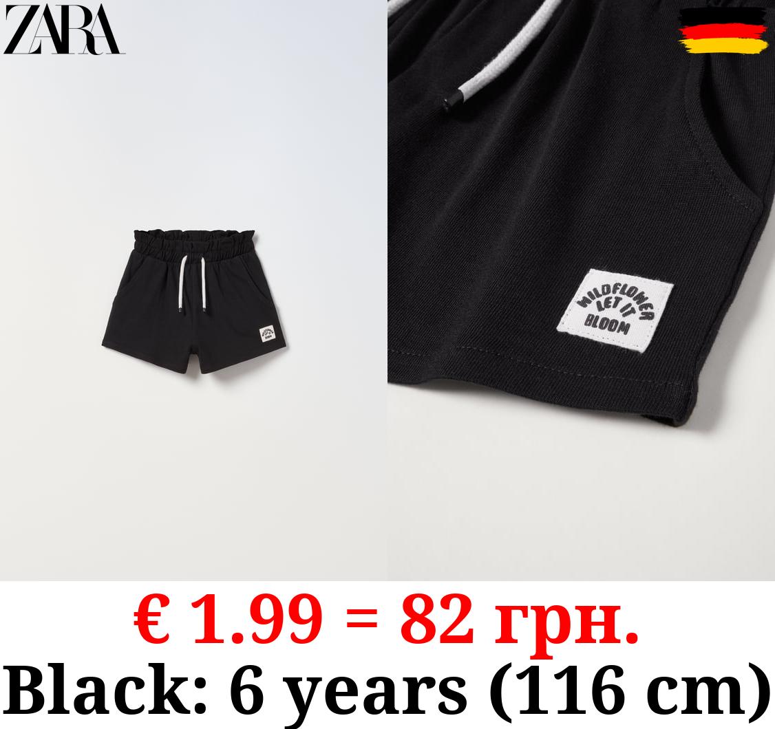 PLUSH BERMUDA SHORTS WITH LABEL DETAIL