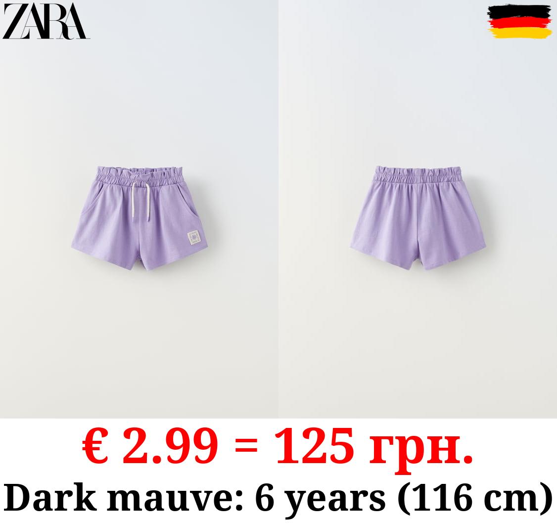 PLUSH BERMUDA SHORTS WITH LABEL DETAIL