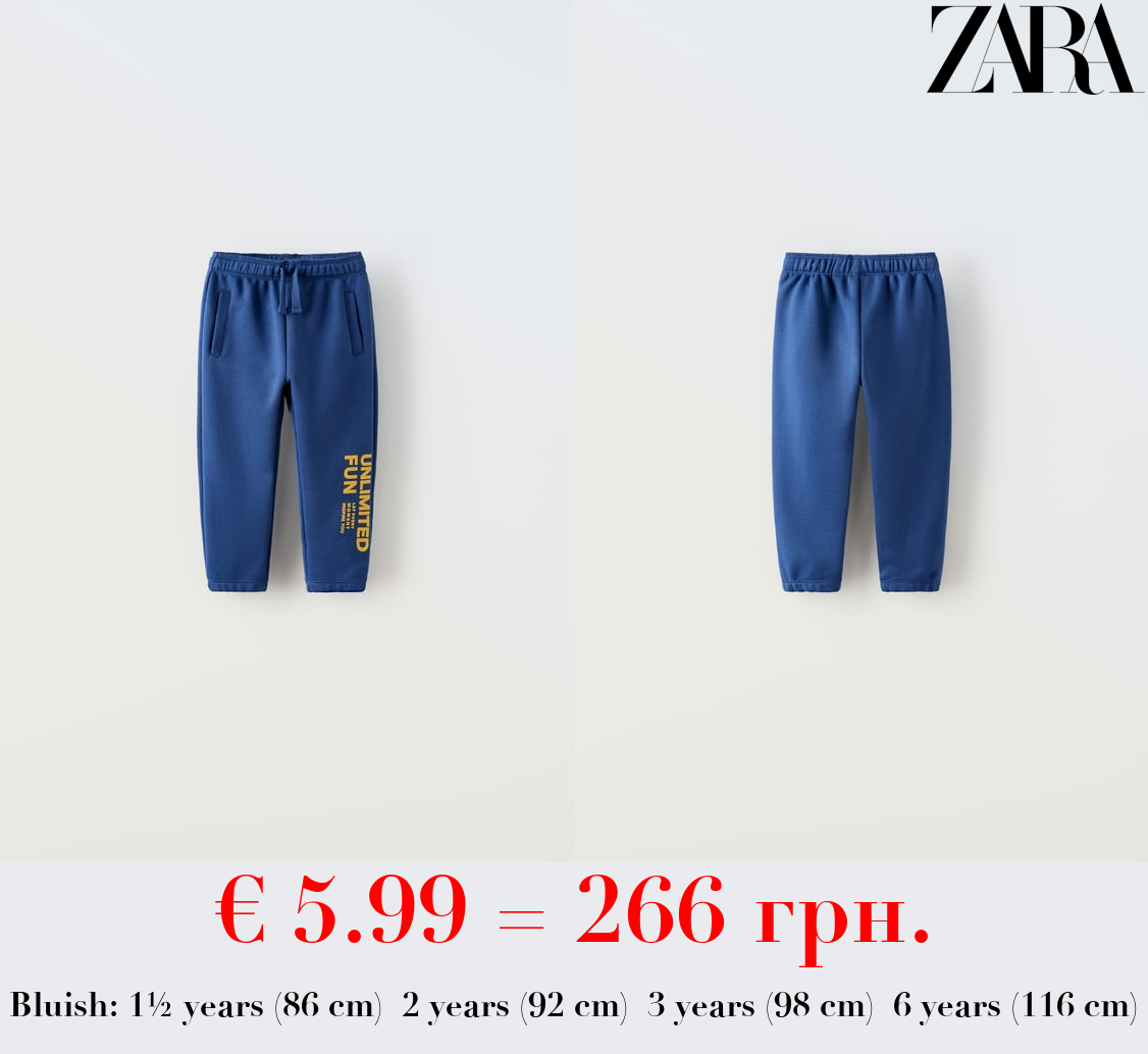 PLUSH TROUSERS WITH RAISED SLOGAN