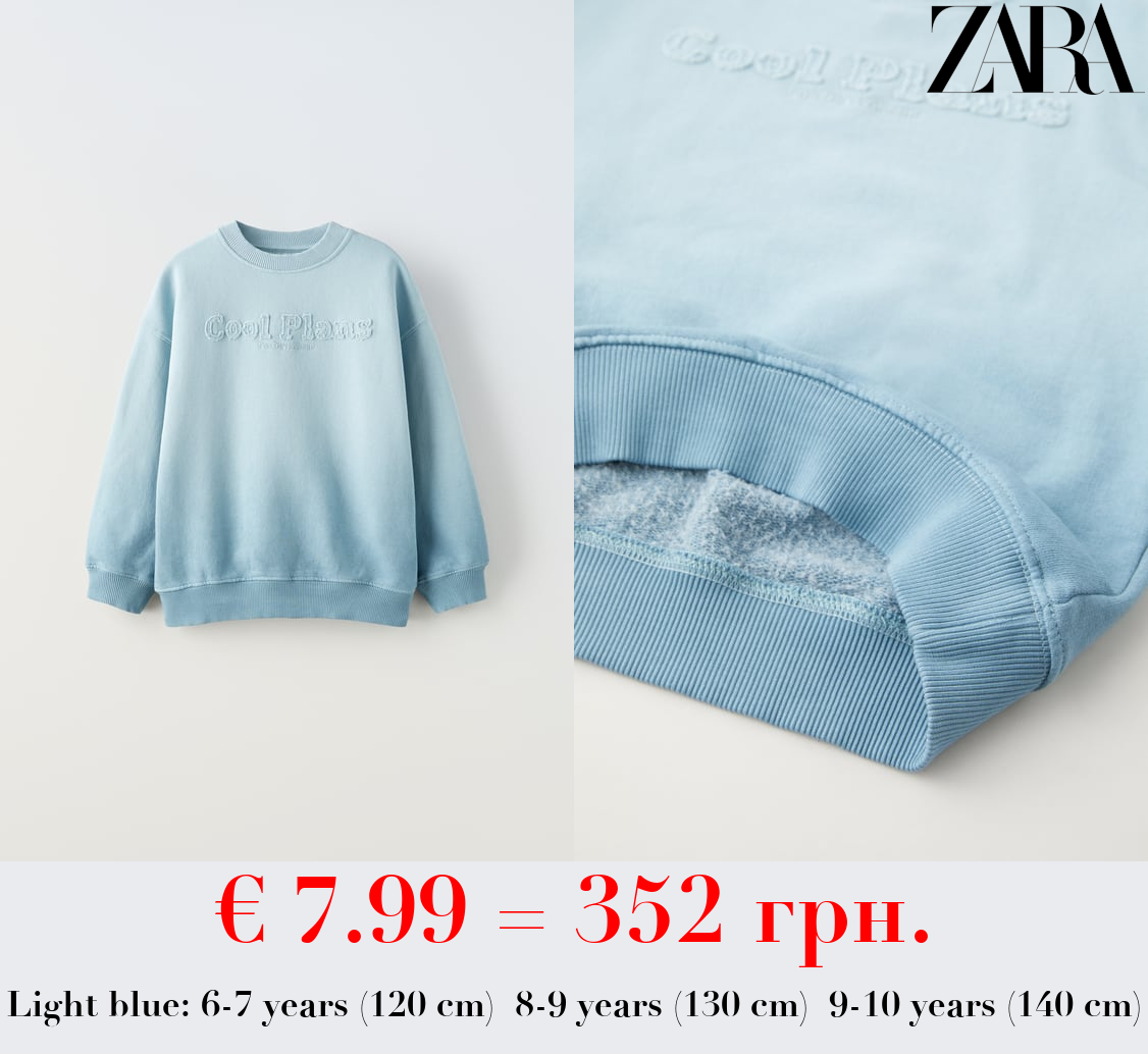 SWEATSHIRT WITH SLOGAN PATCH