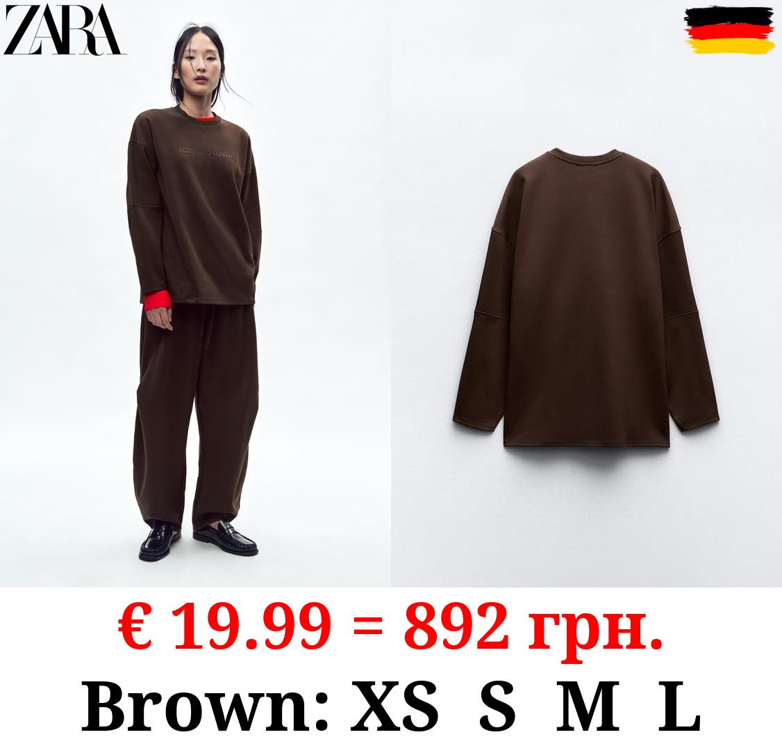 SWEATSHIRT WITH RAISED SLOGAN