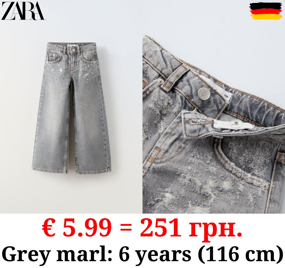 STRAIGHT-FIT RIPPED JEANS