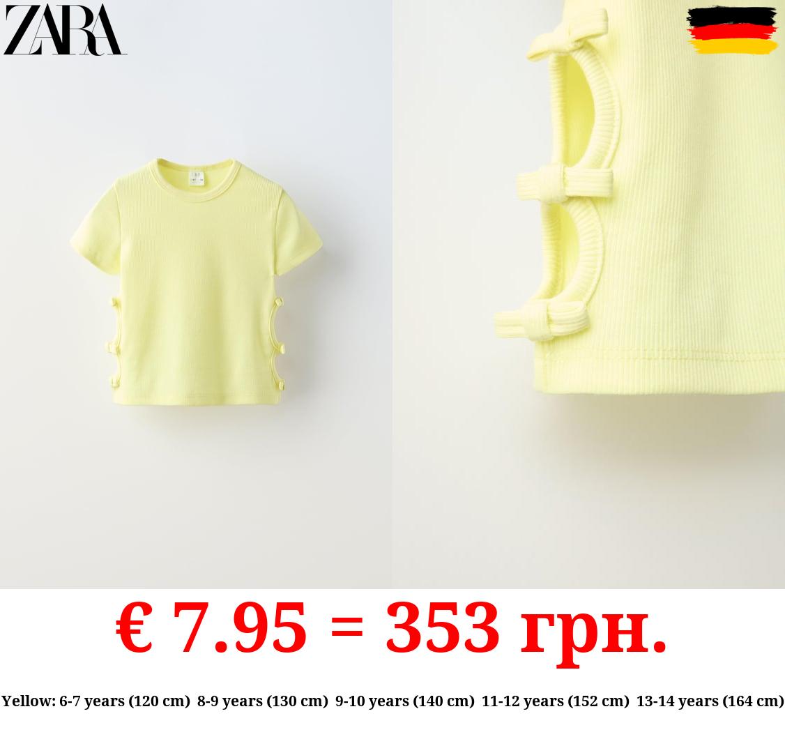 CUT-OUT T-SHIRT WITH BOWS