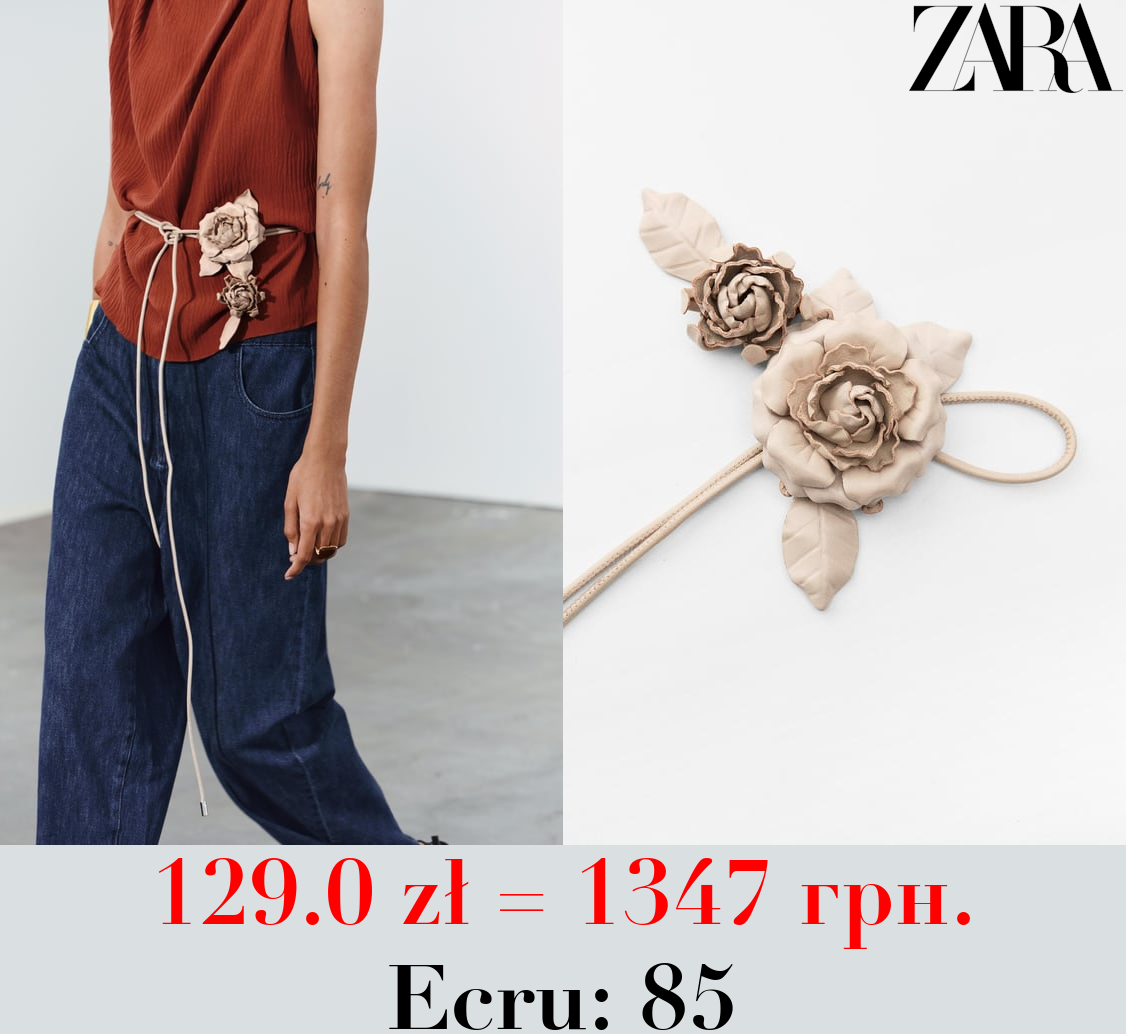 CIRCULAR LEATHER BELT WITH FLOWERS