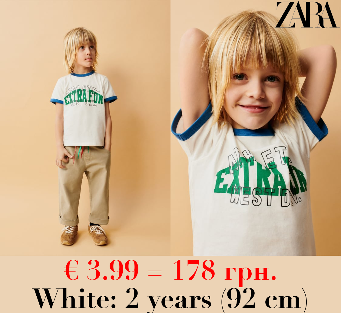 T-SHIRT WITH CONTRAST TRIMS AND SLOGAN